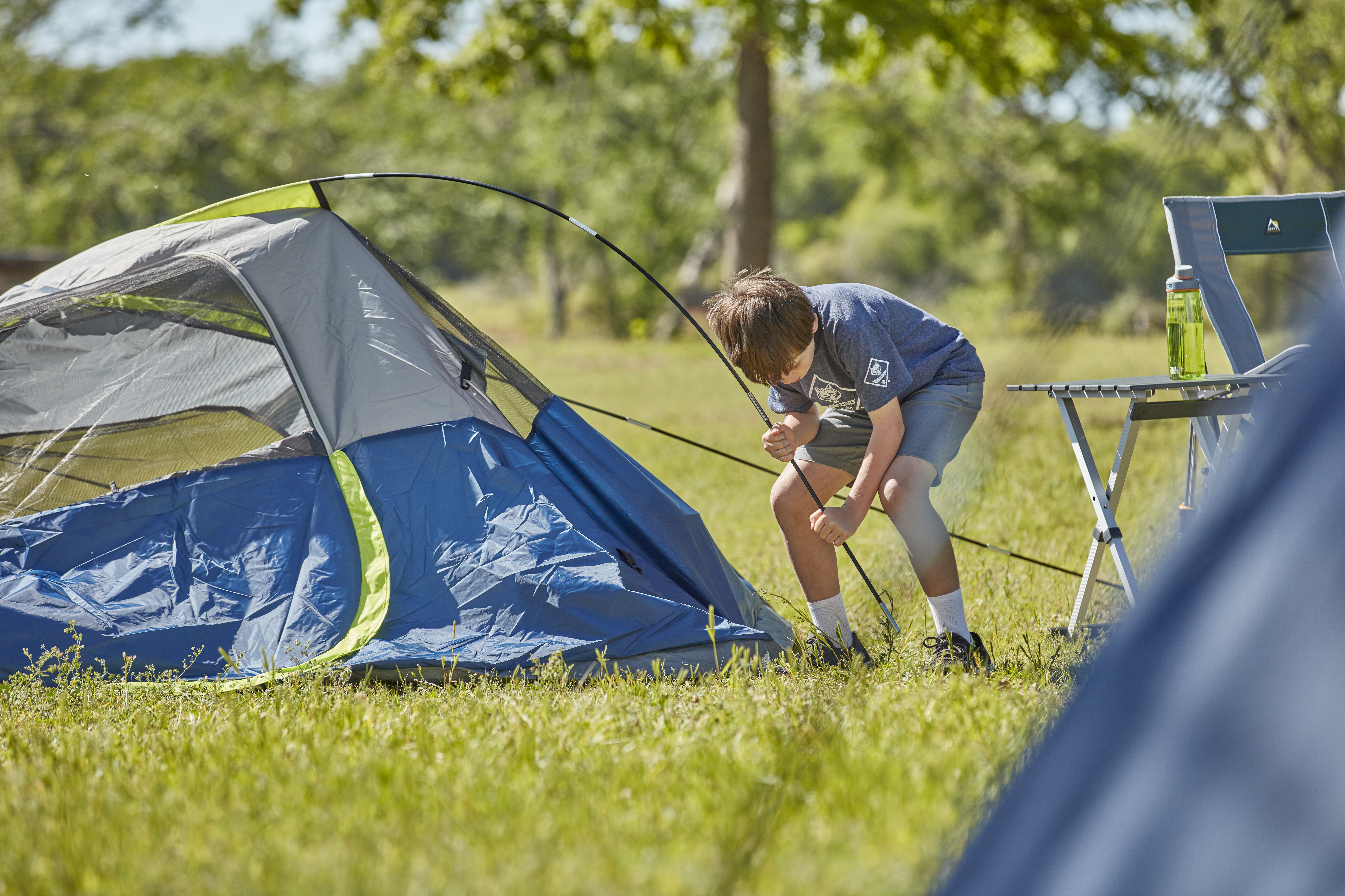 Scout learning to set up camp
